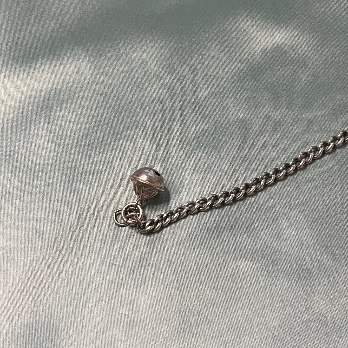 Silver Curb Chain Bracelet with Heart Padlock and Bell Charm